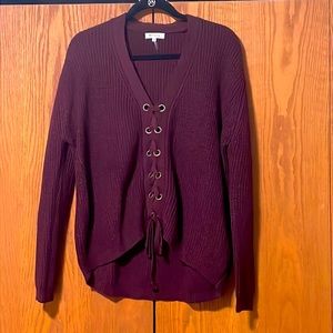 New without tags. Size S/M. Rich purple color with adorable lace up detail.